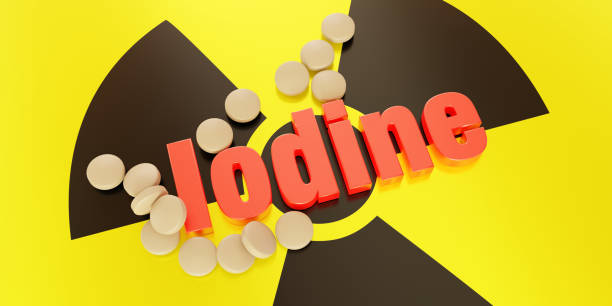 Iodine pill on radiation sign. Potassium iodide tablet for nuclear protection. 3d render stock photo