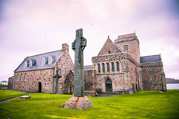 Iona Abbey Iona Abbey, founded by St Columba in AD 563 on the tiny island of Iona just off the Isle of Mull in Western Scotland. abbey monastery stock pictures, royalty-free photos & images
