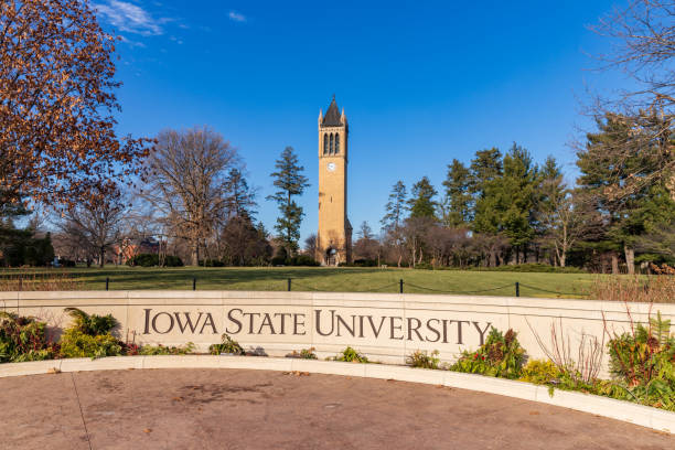 Iowa State University sign in front of the campanile Ames, IA, USA - December 4, 2020: Iowa State University sign in front of the campanile iowa state university stock pictures, royalty-free photos & images