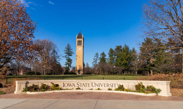 Iowa State University sign in front of the campanile Ames, IA, USA - December 4, 2020: Iowa State University sign in front of the campanile iowa state university stock pictures, royalty-free photos & images