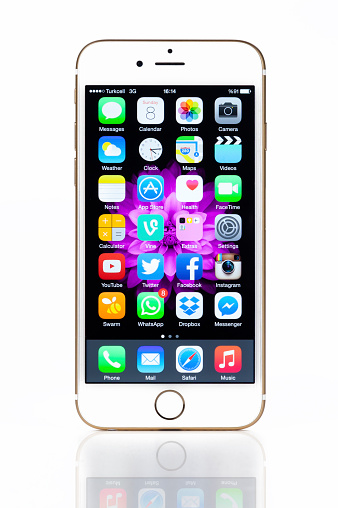 Istanbul, Turkey - February 8, 2015: A front view of a iPhone 6 smartphone isolated on white background. iPhone is a smart cellular phone produced by Apple Computer Inc.