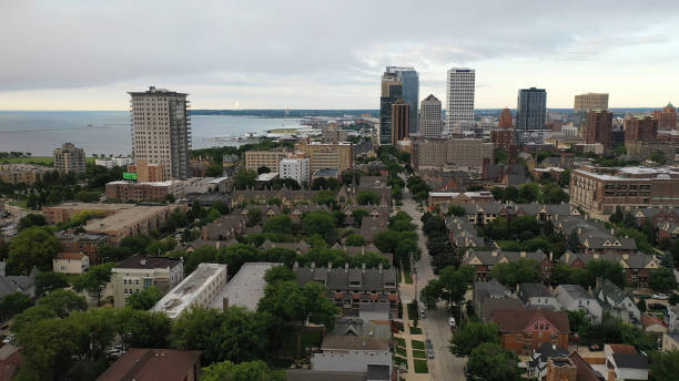 ird's eye view of Downtown Milwaukee Wisconsin. Aerial of the skyline from the north side of the city. Cloudy morning, summer ird's eye view of Downtown Milwaukee Wisconsin. Aerial of the skyline from the north side of the city. Cloudy morning, summer milwaukee shooting stock pictures, royalty-free photos & images