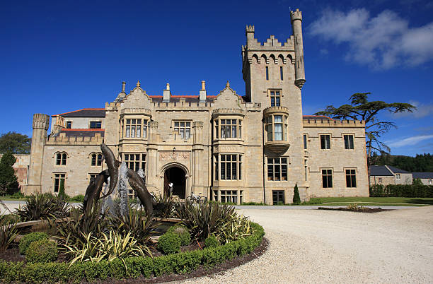 Irish castle Lough Eske castle in Donegal county, Ireland, on a beautiful, sunny day in the summer. county donegal stock pictures, royalty-free photos & images