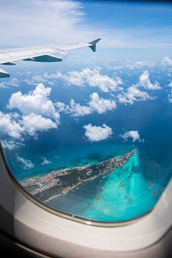 View from an airplane window of Isla Mujeres, an island off the coast of Cancun, Mexico