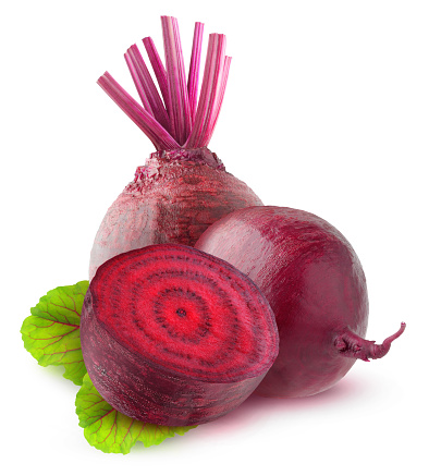 Isolated beetroot. Two raw beetroot vegetables and a half with leaves isolated on white background with clipping path