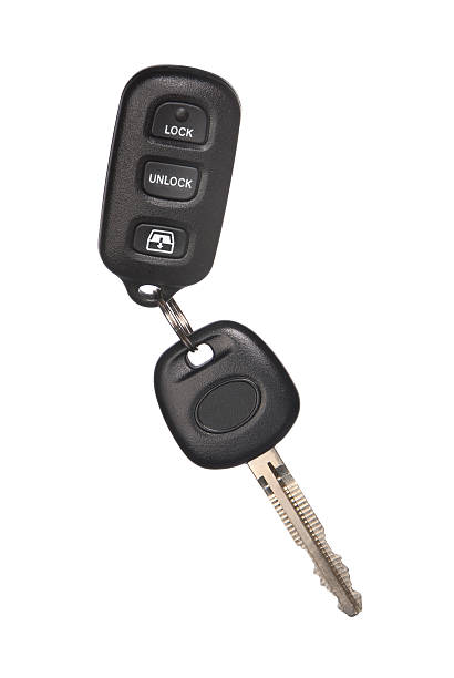 Isolated car key and remote lock device stock photo