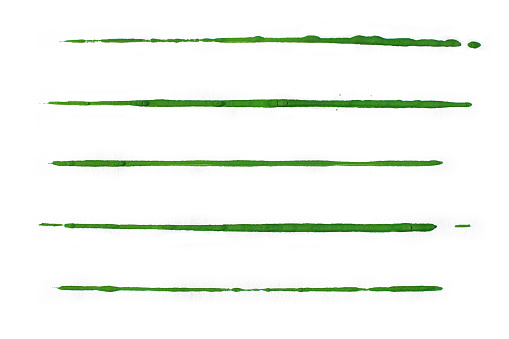 Isolated green watercolor lines on white paper