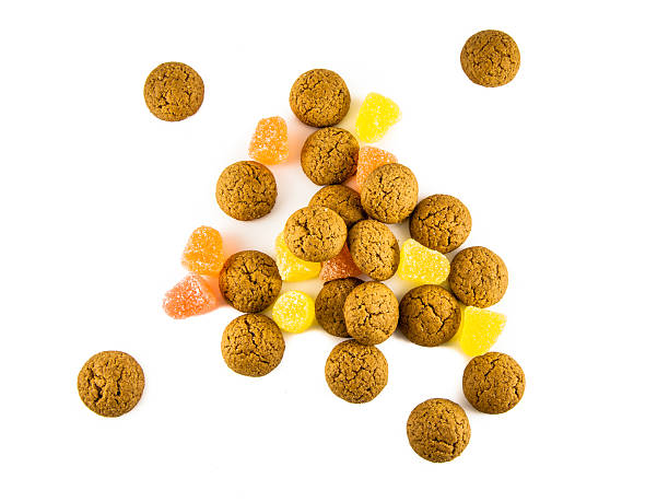 isolated pepernoten and sweets - kruidnoten stockfoto's en -beelden