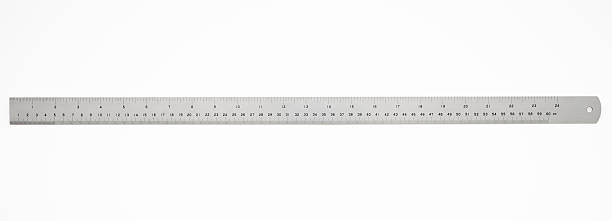 Isolated shot of 60 cm metal ruler on white background 60 cm metal ruler isolated on white background with clipping path.  centimeter ruler stock pictures, royalty-free photos & images