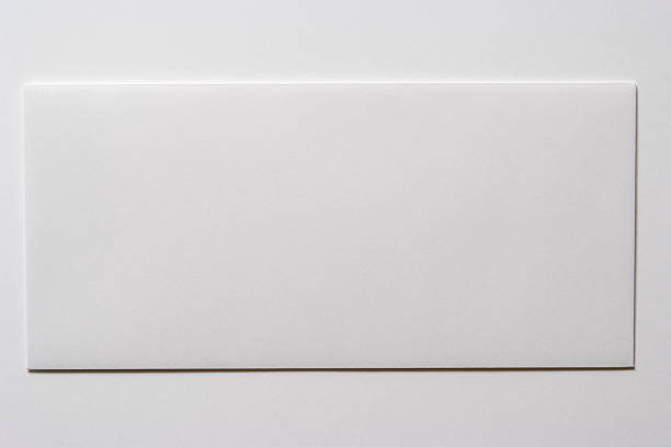 Isolated shot of blank white envelope on white background stock photo