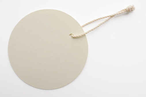 Blank white round tag isolated on white background with clipping path.