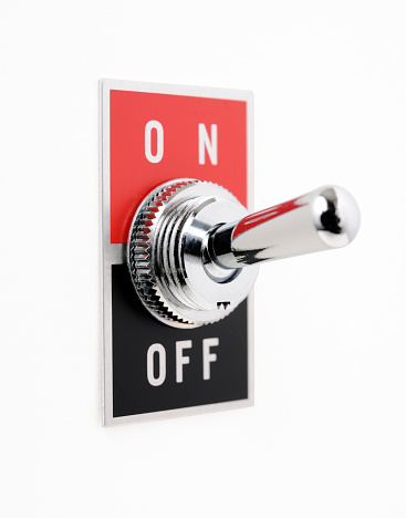 Close-up shot of ON/OFF switch isolated on white background with clipping path.