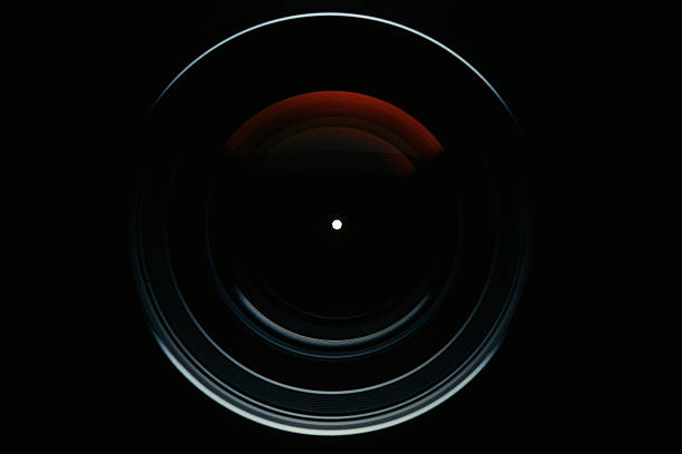 isolated shot of professional camera lens against black background - lens 個照片及圖片檔