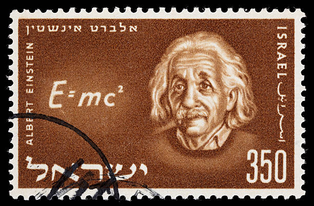 Israel Einstein postage stamp Sacramento, California, USA - March 19, 2011: 1956 Israel postage stamp with a portrait of Albert Einstein to the right of his E=mc2 equation. albert einstein stock pictures, royalty-free photos & images