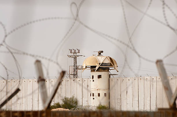 Israeli Gun Tower on Gaza Border Wall stock photo