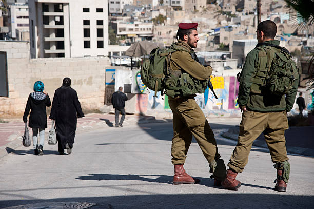 Israeli Soldiers and Hebron Settlement stock photo