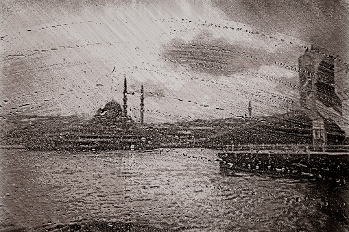 Istanbul with mosque, ship and seagulls in a rainy days. Mist on the glass