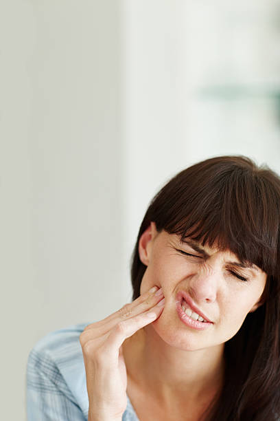 it hurts! - toothache woman bildbanksfoton och bilder