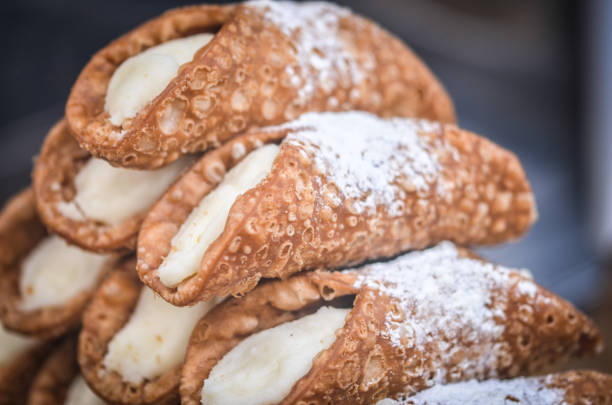 italian cannoli close up view of the italian sweets - cannoli dish cannoli stock pictures, royalty-free photos & images