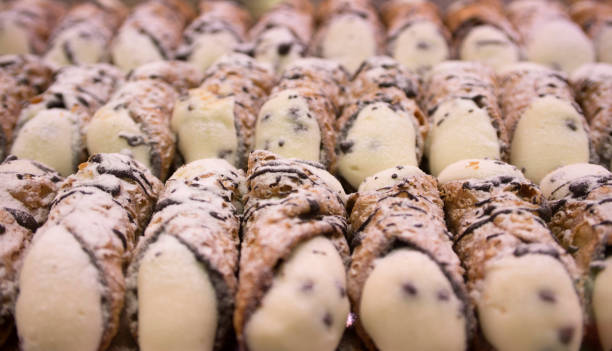 Italian cannoli with ricotta cheese Italian cannoli with ricotta cheese and chocolate cannoli stock pictures, royalty-free photos & images