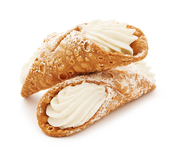 Italian Cannolis Two Italian Cannolis isolated on white cannoli stock pictures, royalty-free photos & images