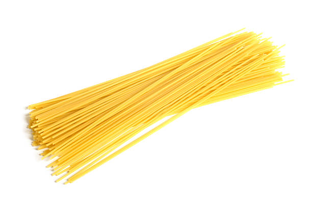 Italian pasta (spaghetti) Italian pasta (spaghetti) on a white background uncooked pasta stock pictures, royalty-free photos & images