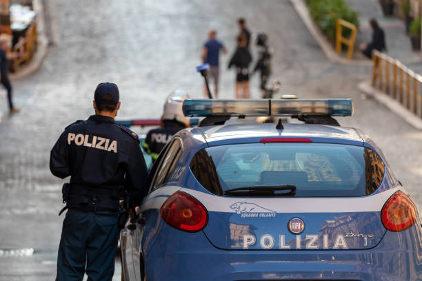 Italian policeman on patrol in the city stock photo