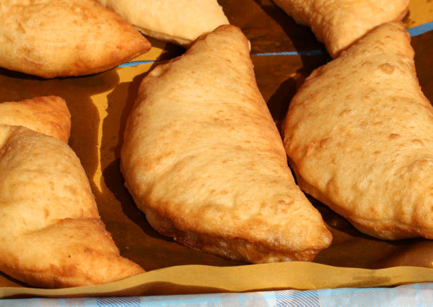 italian stuffed fried bread called Panzerotti or Pizza Puff with stock photo