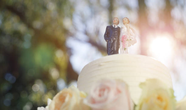 Still life shot of a wedding cake on a table outside