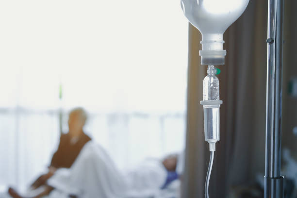iv infusion saline intravenous injection medicine for healing patient illness in hospital  infusion therapy stock pictures, royalty-free photos & images
