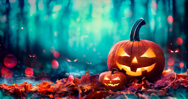 Jack O’ Lanterns On Red Leaves In Spooky Forest With Defocused Ghosts Pumpkins On Autumn Leaves In Spooky Woodland With Defocused Ghosts aqua menthe photos stock pictures, royalty-free photos & images