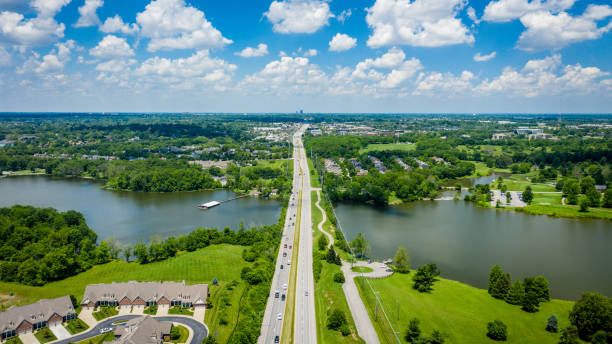 Jacobson Park Lake Aerial view of Jacobson Park Lake and Richmond Road in Lexington, Kentucky kentucky stock pictures, royalty-free photos & images