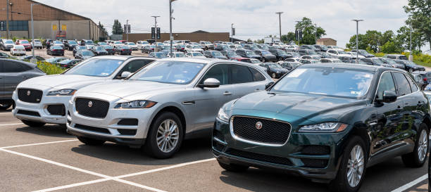 Jaguar SUVs lined up at a dealership stock photo