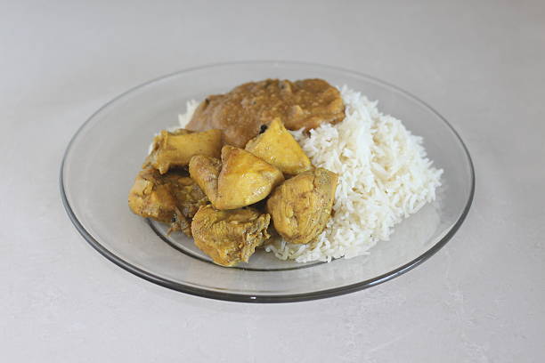 Jamaican Curry Chicken and Dhal stock photo