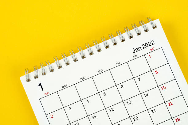 January month, Calendar desk 2022 for organizer to planning and reminder on yellow background. stock photo