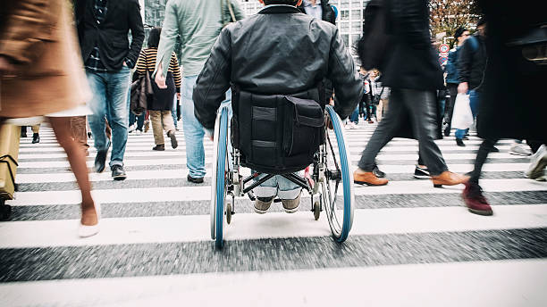 japanese man in wheelchair - wheelchair street imagens e fotografias de stock