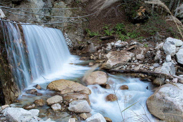 Japanese Mountain Stream Long exposure gives sense of motion in this Japanese Mountain Stream erik trampe stock pictures, royalty-free photos & images