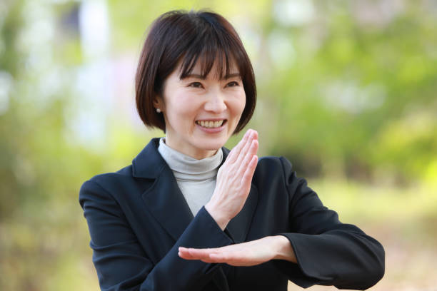 Japanese Sign Language "Thank you" stock photo