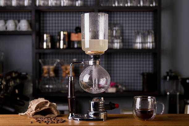 Japanese Siphon Coffee Maker with Halogen Beam Heater Japanese Siphon Coffee Maker with Halogen Beam Heater siphon stock pictures, royalty-free photos & images