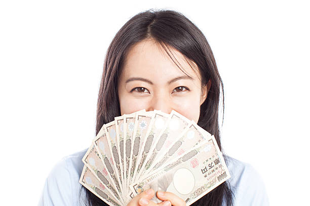 Japanese woman having Japanese yen stock photo