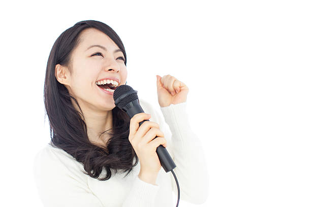 Japanese woman singing stock photo