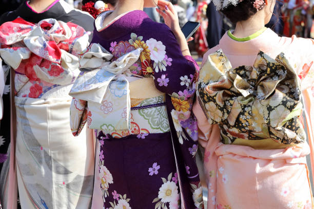 Japanese young women wearing traditional kimono Kagawa, Japan - January 13, 2019: Young Japanese women wearing traditional kimono for the coming of age day celebration, they turn twenty (seijinsiki, seijinshiki) furisode stock pictures, royalty-free photos & images