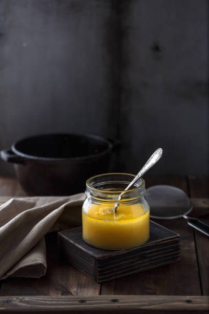 A jar of ghee or clarified butter, copy space stock photo