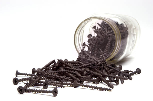 Jar of screws stock photo