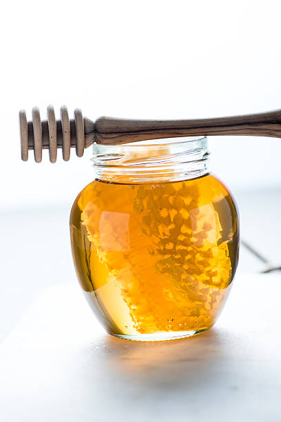Royalty Free Honey Dripping Into Jar Pictures, Images and Stock Photos ...