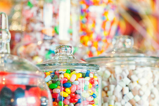 Jars of Candy Close up of various ornate jars full of candy. candy jar stock pictures, royalty-free photos & images