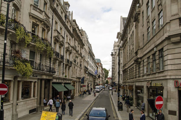 Jermyn Street, St James's, London LONDON, UK - SEPTEMBER 14, 2018: View along the famous Jermyn Street in the St James's district of Westminster, London.  Noted for its many tailors and other gentlemen's outfitters. The scientist Isaac Newton and Napoleon III both lived here. isaac newton picture stock pictures, royalty-free photos & images