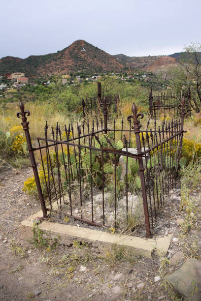 Jerome Arizona Miners Cemetery on Boot Hill The historic old miner's cemetery on Boot Hill in Jerome, Arizona with view of the old hillside mining town in the background. jerome arizona stock pictures, royalty-free photos & images
