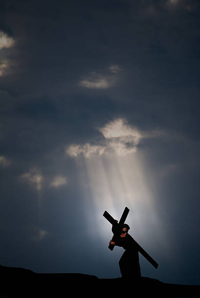 Jesus and the Crucifix  good friday stock pictures, royalty-free photos & images