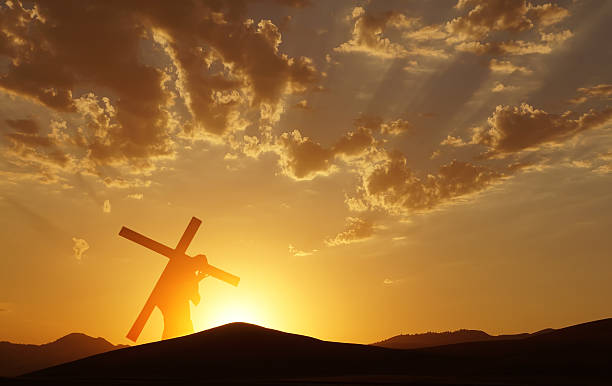 Jesus Christ Carrying Cross up Calvary on Good Friday  good friday stock pictures, royalty-free photos & images